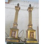 A pair of gilt column table lamps