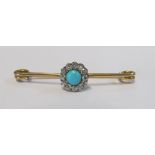 A gold turquoise and diamond cluster brooch