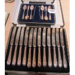 Twelve silver handle knives and six silver spoons and tongs (i.c)