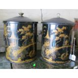 Two black oriental style coal bins different knops