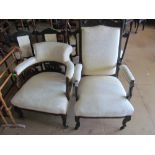 An Edwardian salon suite armchair, two matching side chairs and a tub shaped chair