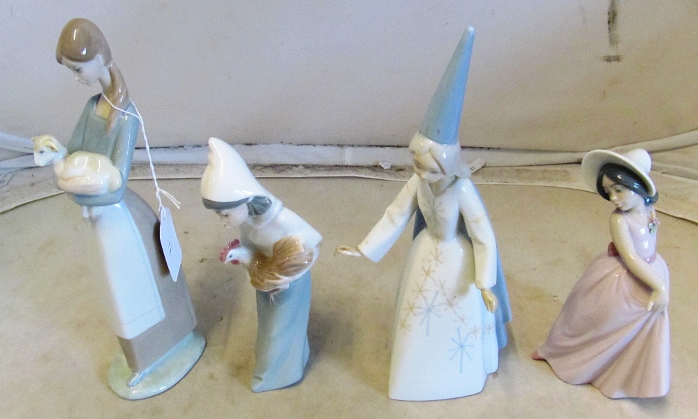 Four Lladro figures ladies (one a/f)