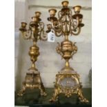 A pair of brass candelabra