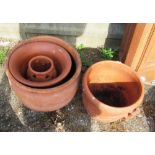 Four terracotta pots