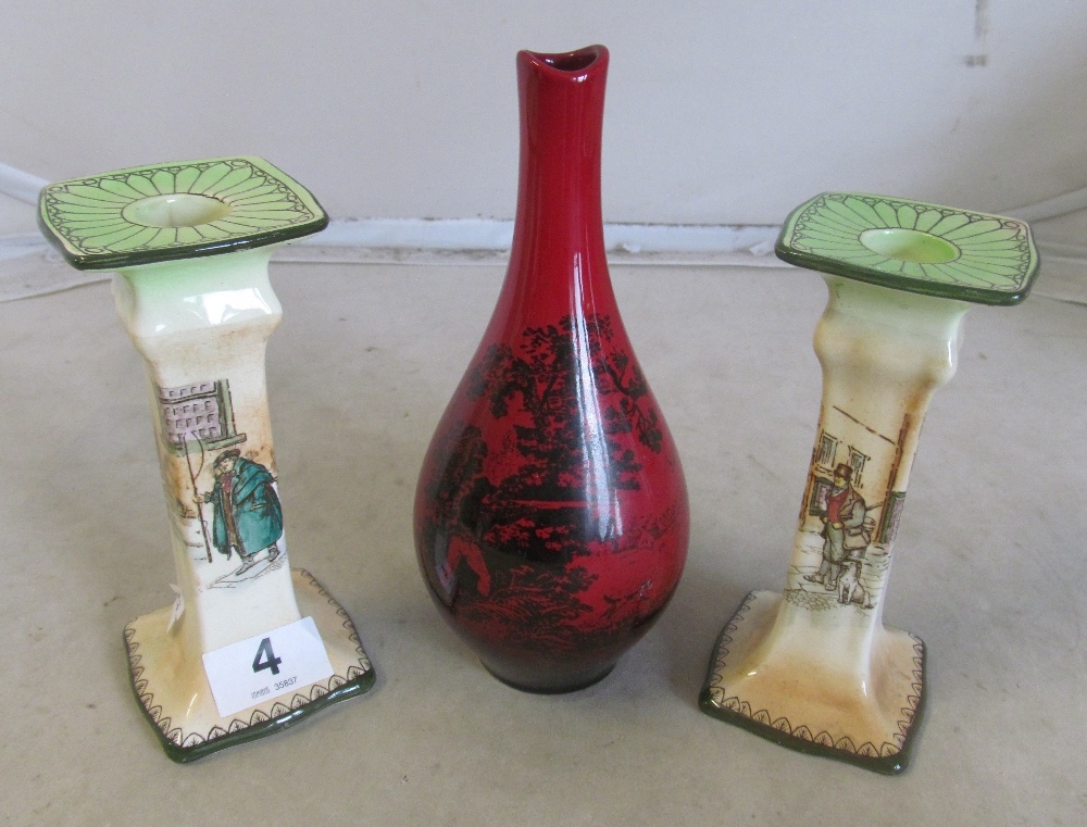 A Royal Doulton flambé vase hunting scene and pair Dickensware 1920's candlesticks