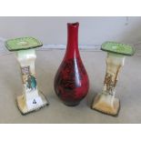 A Royal Doulton flambé vase hunting scene and pair Dickensware 1920's candlesticks