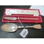 A silver marrow scoop (in Asprey box), two William Eley silver spoons and another