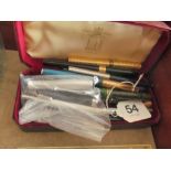 Various pens in Dunhill box