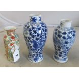 Two blue and white Chinese vases flowers and small Famille Verte vase (all restored)