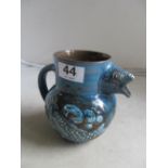 A Brannam blue fish jug (glaze missing just under mouth)
