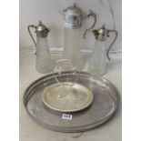 A plated tray, stand, and 3 claret jugs