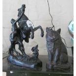 A Spelter Marley horse and groom (black coated) and an old cast iron cat doorstop