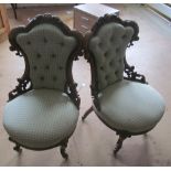 A pair of Victorian salon chairs on cabriole legs