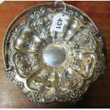 A silver swing handled basket embossed shell and flower design 17.8 troy oz