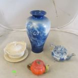 A blue and white vase, lidded dish on tray, teapot and teapot