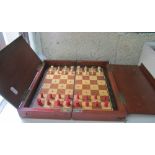 A travelling Chess set with bone pieces