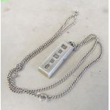 A silver ingot on chain