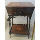 A pretty rosewood sewing table