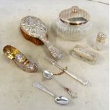 A white metal shoe marked 925, silver lidded dressing table jar and a few other items