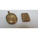 Two gold coloured lockets