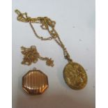 A gold front and back locket on chain and another locket on chain
