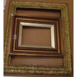 A decorative gilt rectangular picture frame and another