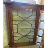 A Georgian mahogany hanging corner display cupboard