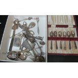 Some silver spoons and other silver items in rectangular box some plated