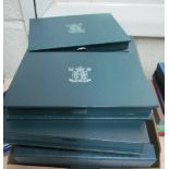 A collection of UK 'Proof Coin Collections' issued in presentation cases by the Royal Mint 1983 -