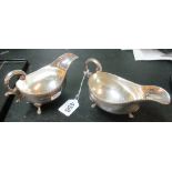 A pair of silver gravy boats with gadrooned borders 13oz