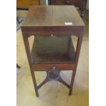 A 19th Century mahogany washstand with hinged top and undertier with drawer