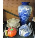 A blue and white vase, lidded dish on tray, teapot and teapot