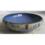 A Royal Doulton bowl stylized blue and green flowers