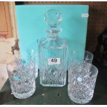 A Tiffany decanter and four glasses (boxed)