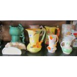 A SylvaC jug with elf handle, rabbit wall vase and various other jugs