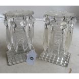 A small pair of cut glass table lustres