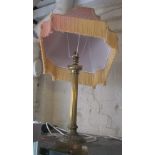 A brass table lamp