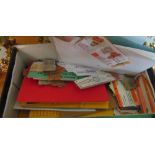 A shoe box of bus tickets and another rail tickets