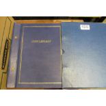A blue coin album with mixed British coins including pre 1920, a 1905 florin and 1821 crown