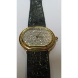 A Baume & Mercier 18k diamond faced ladies watch with black crocodile effect strap together with box