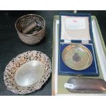 A small group of silver items