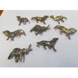 Eight metal animal place name holders