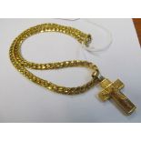 A 9ct gold cross on gilt chain and another 9ct gold cross