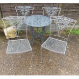 A garden table and four chairs