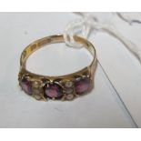 A 15ct gold almandine garnet and seed pearl ring 1.8g