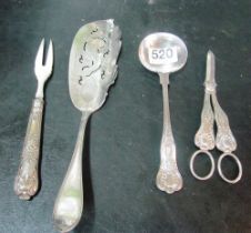 A pair of plated grape scissors, spoon, server and fork