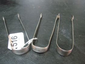 Three pairs of Georgian silver sugar tongs 3 ozs