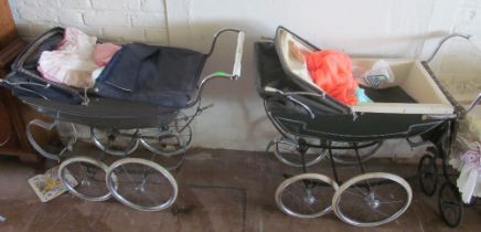 Five doll's prams