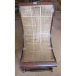 A Regency rosewood caned slipper chair