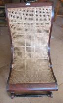 A Regency rosewood caned slipper chair